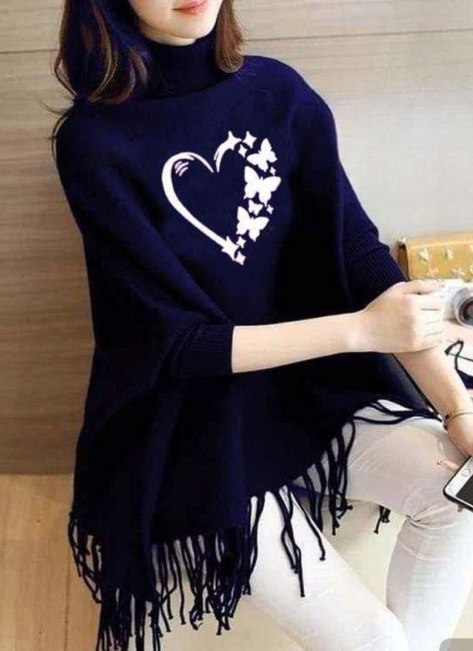 Cozy Knitted Turtleneck Poncho with Graphic Print and Fringe